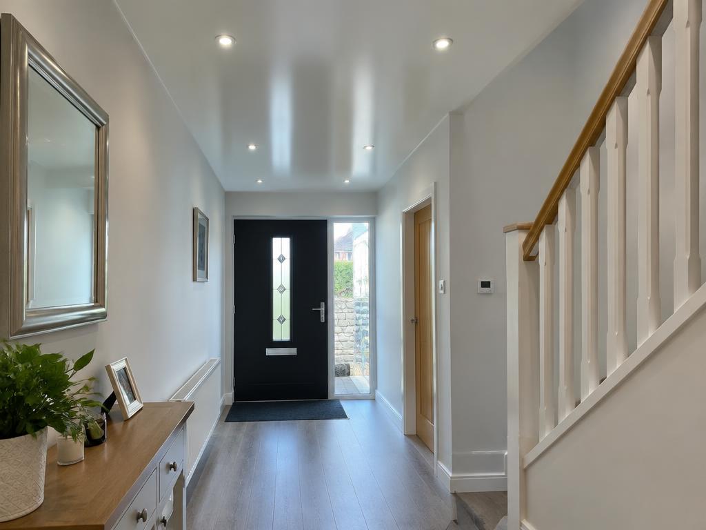 Smooth hallway ceiling with spotlights